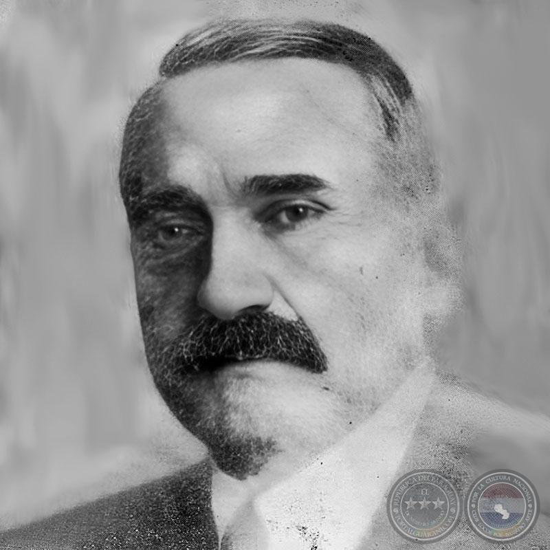 LUIS E.