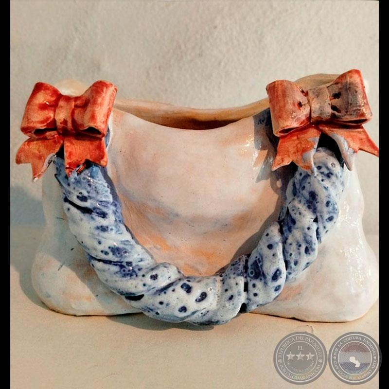 Escultura de la serie "La Era Coquette" CARTERA 5 - Escultura de Florencia Banquer